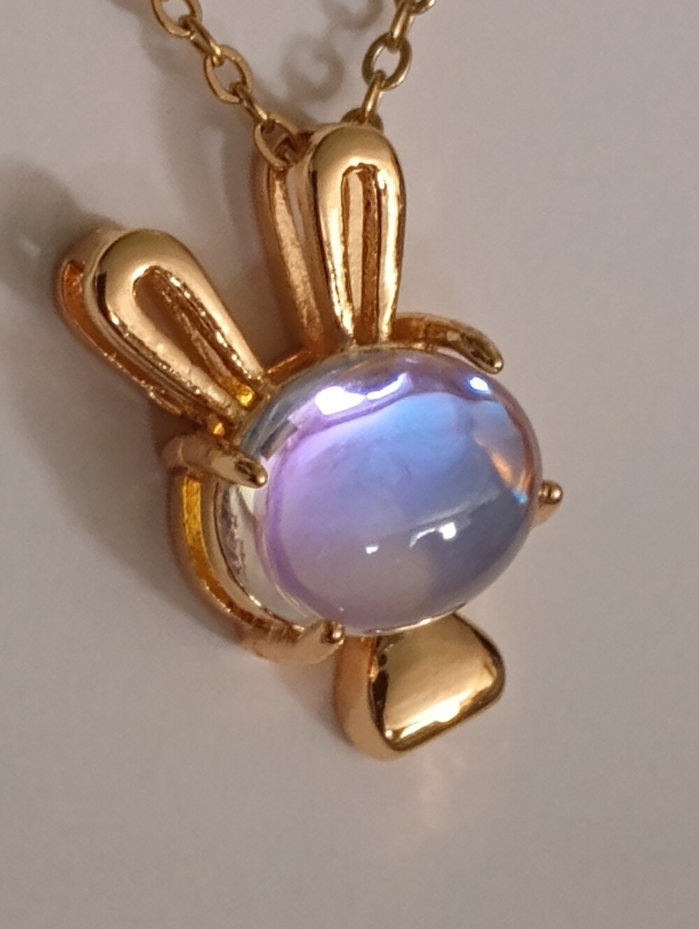 Fashion Jewelry Gold Bunny Necklace with Opalescent Blue Stone - Picture 5 of 11